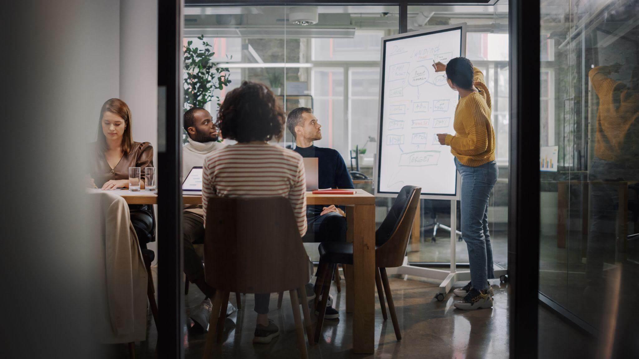 People collaborating at a table for content review